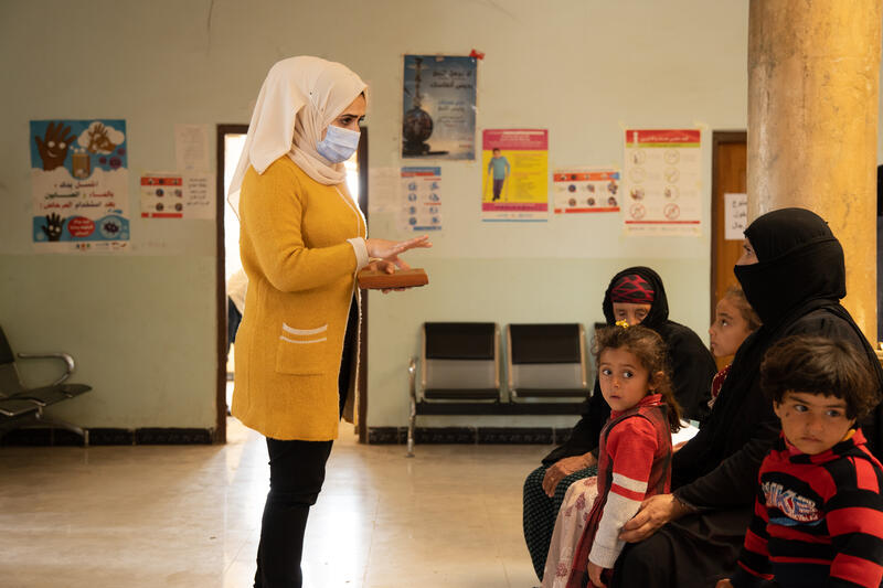 MSF mental health promotion team member conducting a health promotion session with a group of women and their children in the Abbasi subdistrict of Hawija, in western Kirkuk. 