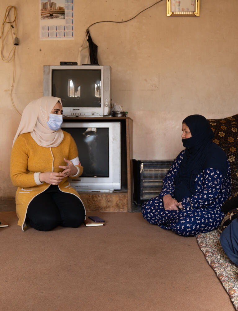 Amira and Sufyan, MSF mental health promotion team, providing an awareness session to a family in Al-Abbasi subdistrict about mental health and the services MSF provide in the non-communicable diseases clinic.